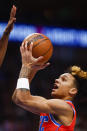 Oklahoma City Thunder guard Tre Mann (23) attempts to shoot during the second half of an NBA basketball game against the Dallas Mavericks, Monday, Jan. 17, 2022, in Dallas. (AP Photo/Brandon Wade)