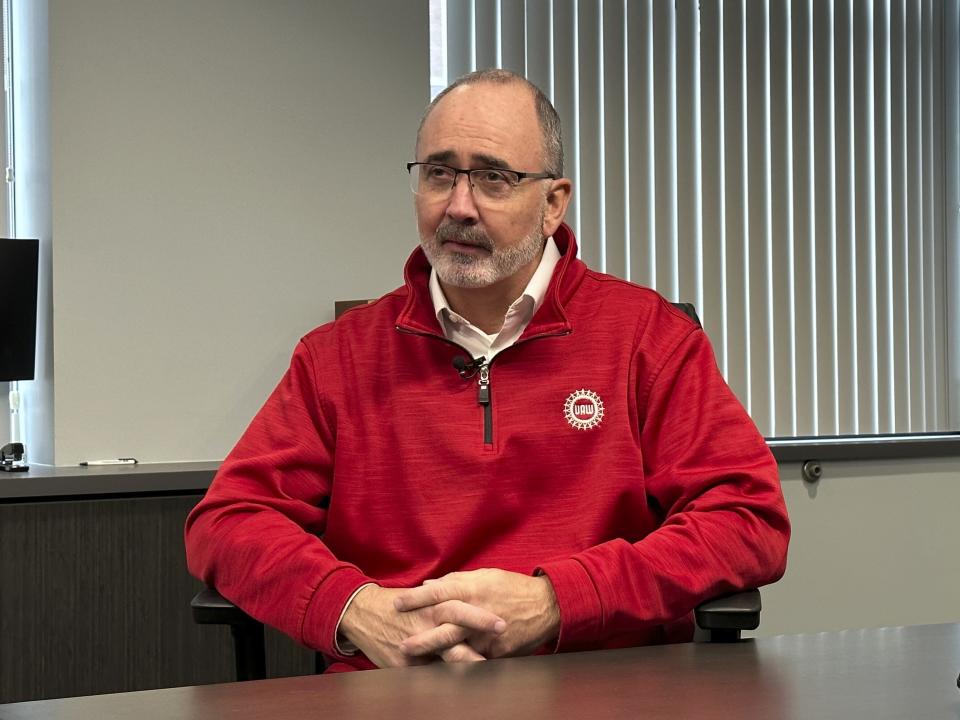 United Auto Workers President Shawn Fain speaks to a reporter from The Associated Press during an interview at the union's headquarters Monday, Nov. 20, 2023, in Detroit. (AP Photo/Mike Householder)