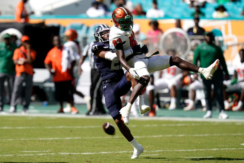 Jackson State safety Jalin Hughes (27) breaks up a pass intended for Florida A&M wide receiver Darian Oxendine (83) during the first half of the Orange Blossom Classic NCAA college football game, Sunday, Sept. 4, 2022, in Miami Gardens, Fla. (AP Photo/Lynne Sladky)