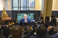 As President Donald Trump addresses the 73rd session of the United Nations General Assembly, members of the media watch a video feed of the speech outside the GA Hall, Tuesday, Sept. 25, 2018, at UN headquarters. (Angela Weiss/Pool Photo via AP)
