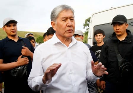 FILE PHOTO: Kyrgyz former President Atambayev meets with journalists at his residence near Bishkek