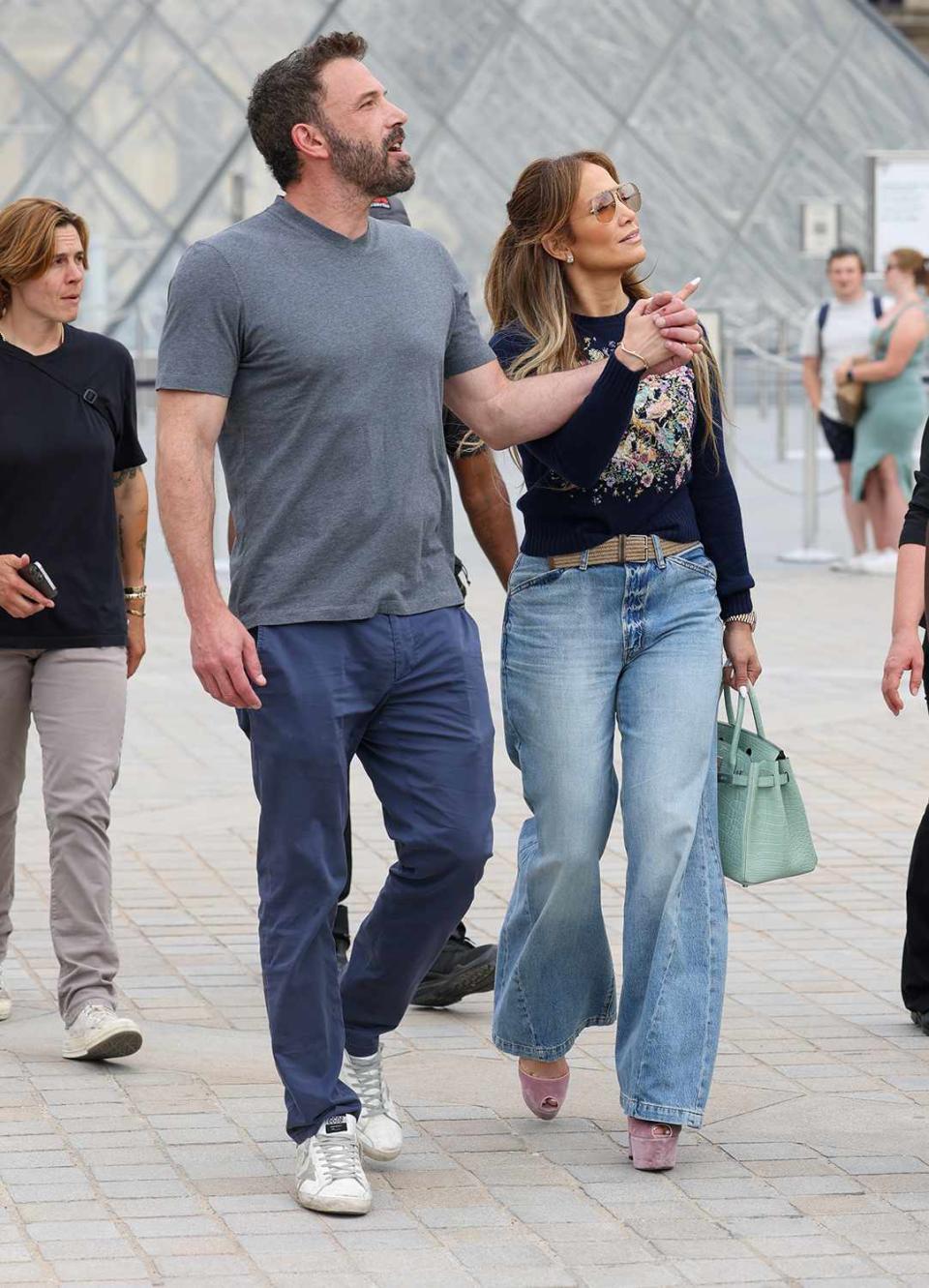 Jennifer Lopez and Ben Affleck are seen at the Louvre Museum on July 26, 2022 in Paris, France.