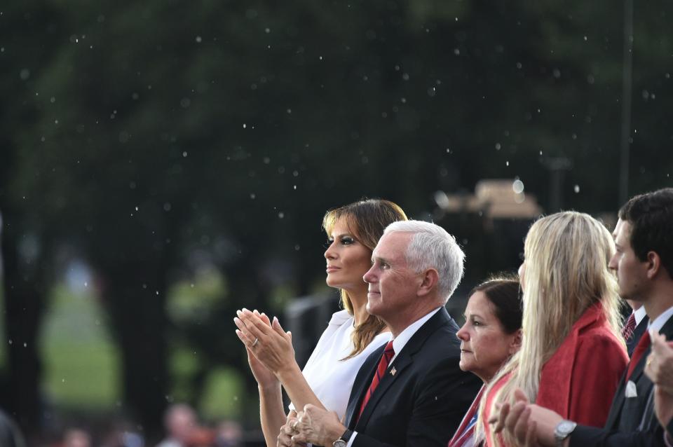 US First Lady Melania Trump and Vice President Mike Pence applaud during the "Salute to America" Fourth of July event at the Lincoln Memorial in Washington, DC, July 4, 2019. (Photo by MANDEL NGAN / AFP)        (Photo credit should read MANDEL NGAN/AFP/Getty Images)