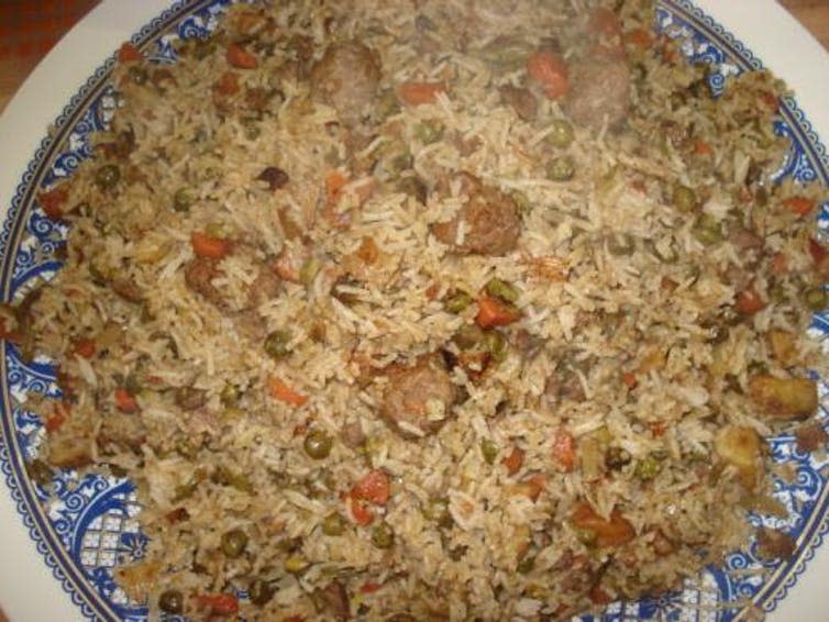 <span class="caption">Iraq’s ‘bryane’, the country’s version of the popular rice dish biryani.</span> <span class="attribution"><a class="link " href="https://commons.wikimedia.org/wiki/File:Bryane.jpg" rel="nofollow noopener" target="_blank" data-ylk="slk:Zaid-khsro via Wikimedia Commons;elm:context_link;itc:0;sec:content-canvas">Zaid-khsro via Wikimedia Commons</a>, <a class="link " href="http://creativecommons.org/licenses/by-sa/4.0/" rel="nofollow noopener" target="_blank" data-ylk="slk:CC BY-SA;elm:context_link;itc:0;sec:content-canvas">CC BY-SA</a></span>