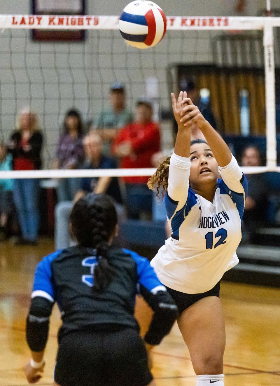 Ridgeview's Mariah Bostic-Jones (12) lunges for the ball during the Region 1-5A volleyball final against Ocala Vanguard. Ridgeview placed three players on the All-Clay County first team.