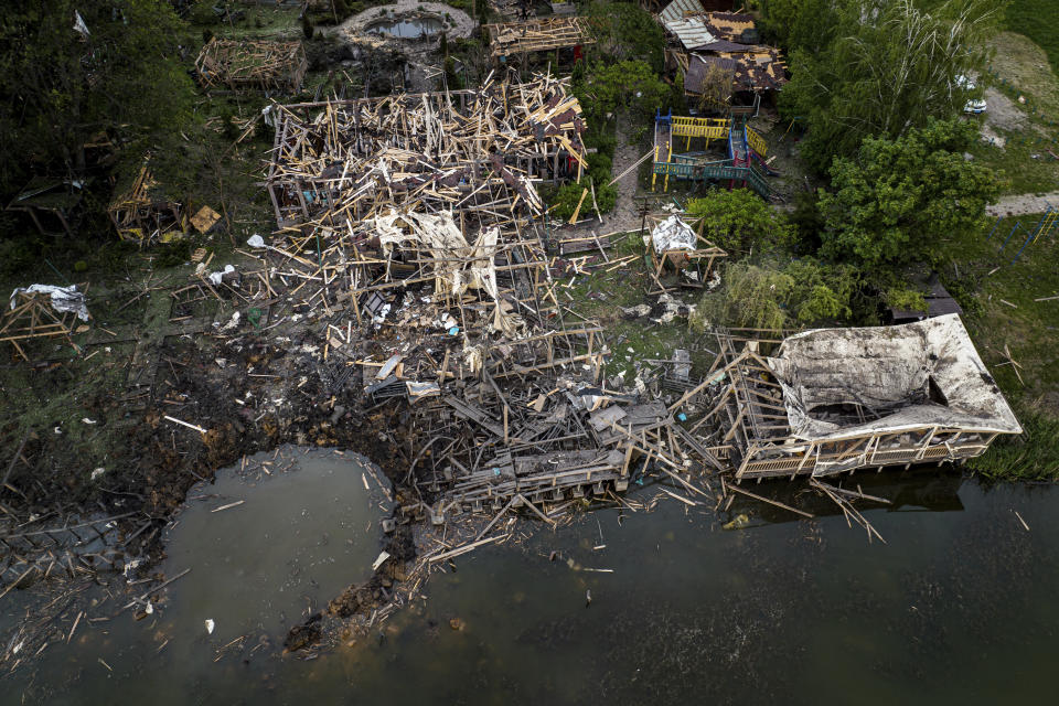 FILE – A destroyed resort compound is seen from above after a Russian rocket attack near Kharkiv, Ukraine, Sunday, May 19, 2024. According to officials, 6 people were killed in this attack. (AP Photo/Evgeniy Maloletka, File)