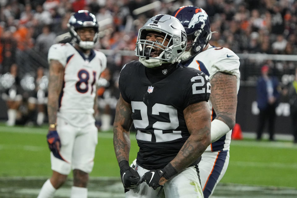 Las Vegas Raiders defensive back Keisean Nixon (22) celebrates after tackling Denver Broncos quarterback Drew Lock (3) during the second half of an NFL football game, Sunday, Dec. 26, 2021, in Las Vegas. (AP Photo/Rick Scuteri)