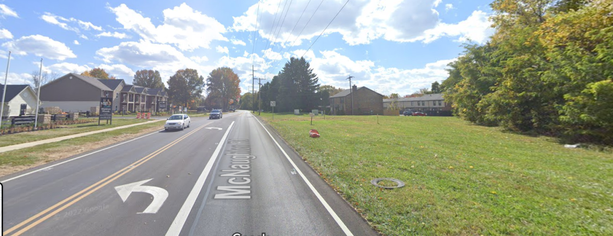 Metro Development LLC applied to rezone about eight acres of land at 1555 McNaughten Road, at right in this 2022 image, in hopes of building up to 126 apartment units on the site, a mix of wooded and open land on the Far East Side. The property is nearly surrounded by other multi-family residential complexes, including Waldren Apartments located across the road and built by the same developer. But Columbus City Council on Monday voted 5-2 against the request, citing lack of infrastructure such as sidewalks for pedestrians along the busy two-lane road.