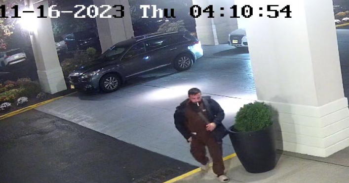 Surveillance footage showing Leonardo Petrosillo allegedly entering a hotel near Teterboro Airport.