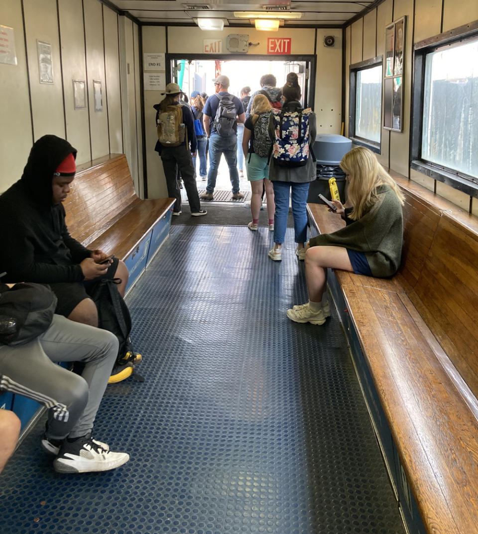 Students and other commuters aboard a ferry headed from the southern tip of Manhattan to Governors Island. (Jo Napolitano)