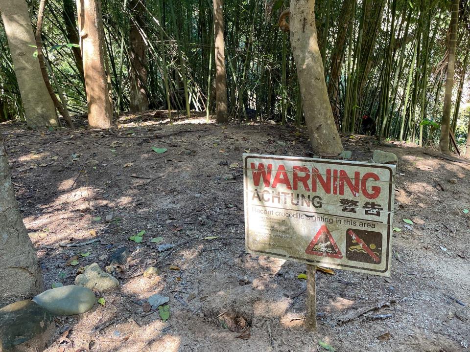 A sign warning visitors or recent crocodile sightings.