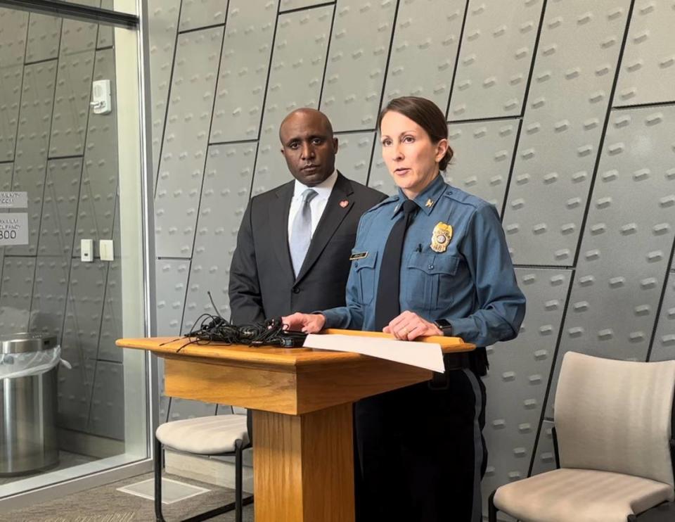 Police Chief Stacey Graves and Mayor Quinton Lucas, left, at a news conference Sunday afternoon.