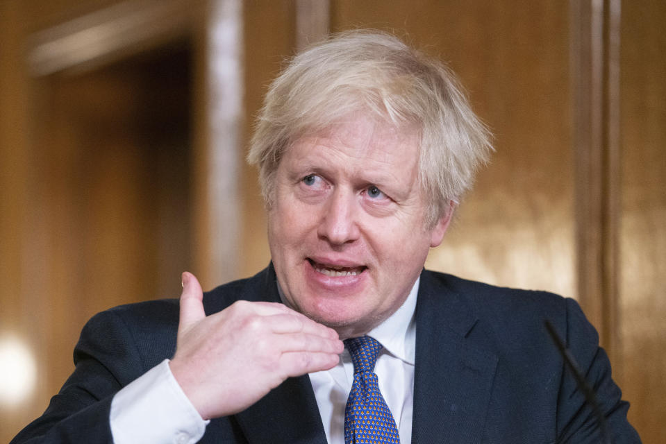 Britain's Prime Minister Boris Johnson speaks during a media briefing on COVID-19, in Downing Street, London, Friday Jan. 15, 2021. (Dominic Lipinski/Pool via AP)