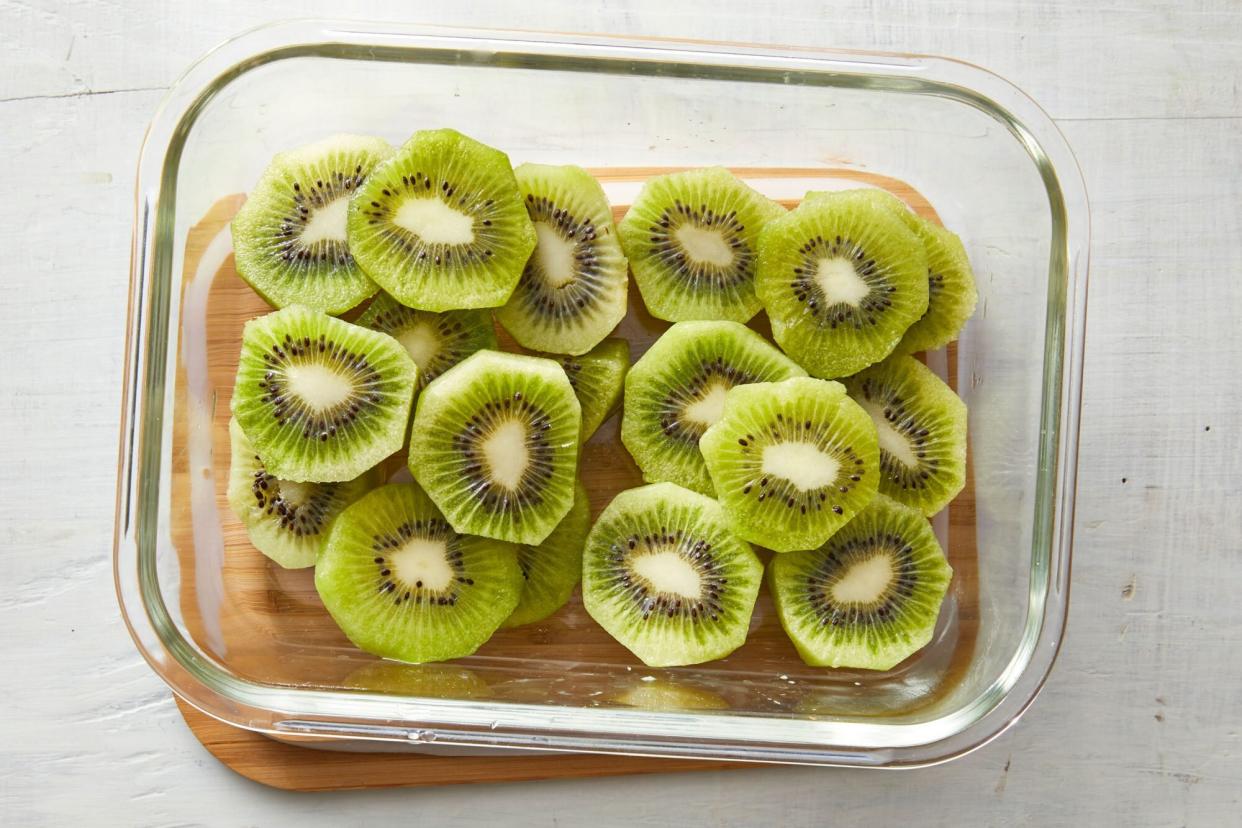 kiwi slices in a glass food storage container