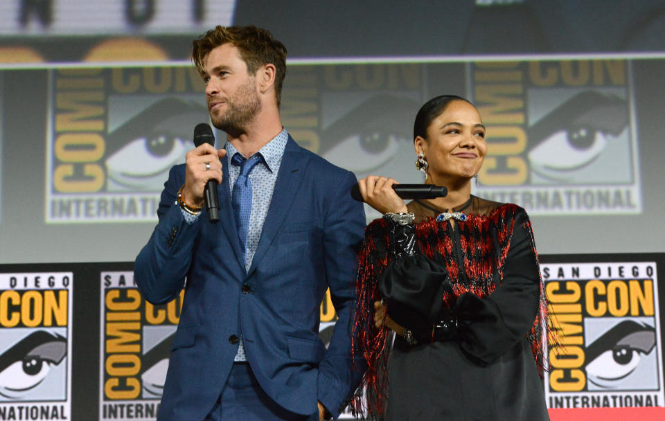 SAN DIEGO, CALIFORNIA - JULY 20: Chris Hemsworth and Tessa Thompson speak at the Marvel Studios Panel during 2019 Comic-Con International at San Diego Convention Center on July 20, 2019 in San Diego, California. (Photo by Albert L. Ortega/Getty Images)