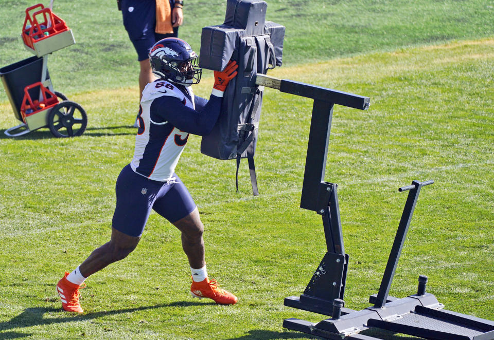 Denver Broncos linebacker Von Miller takes part in drills during an NFL football practice Thursday, Sept. 3, 2020, in Englewood, Colo. (AP Photo/David Zalubowski)