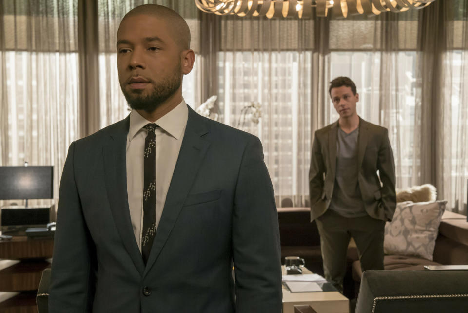 This image released by Fox shows Jussie Smollett, left, and A.Z. Kelsey in a scene from the "Pride" episode of "Empire" which originally aired on Oct. 10, 2018. Smollett’s co-starring role in “Empire” may end up being the pinnacle of his career, industry observers and insiders said as the actor faces criminal charges that he faked a hate crime against himself. (Chuck Hodes/FOX via AP)