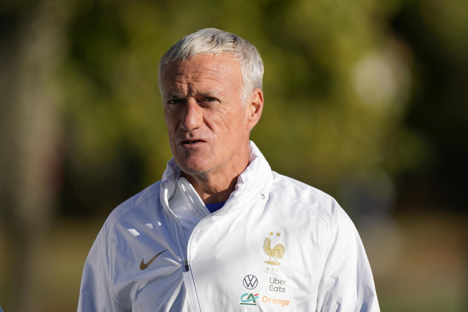 France's head coach Didier Deschamps, center, attends a training session of the French national soccer team at Clairefontaine training center, south of Paris, France, Monday, Sept. 19, 2022. (AP Photo/Francois Mori)