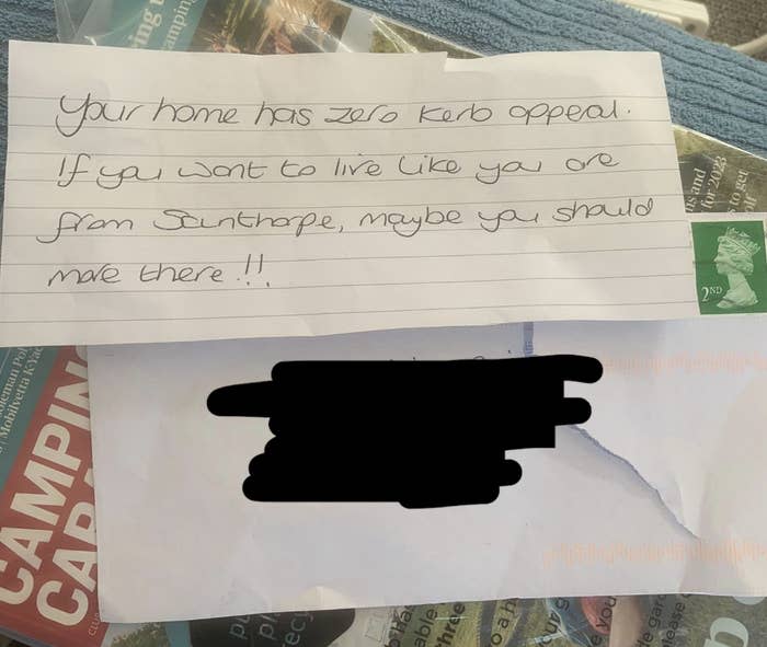 A note saying someone's house has no curb appeal, and if they want to live like they're in a different place, maybe they should move there