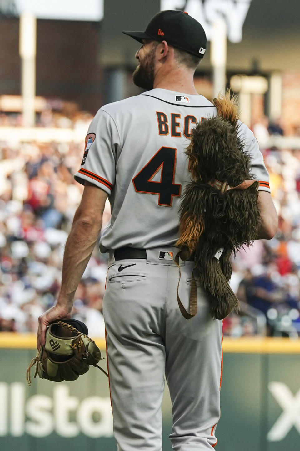 San Francisco Giants relief pitcher Tristan Beck walks to the bullpen during the first inning of the team's baseball game against the Atlanta Braves on Saturday, Aug. 19, 2023, in Atlanta. (AP Photo/John Bazemore)