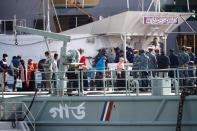 Rohingyas board a ship as they are moving to Bhasan Char island in Chattogram,