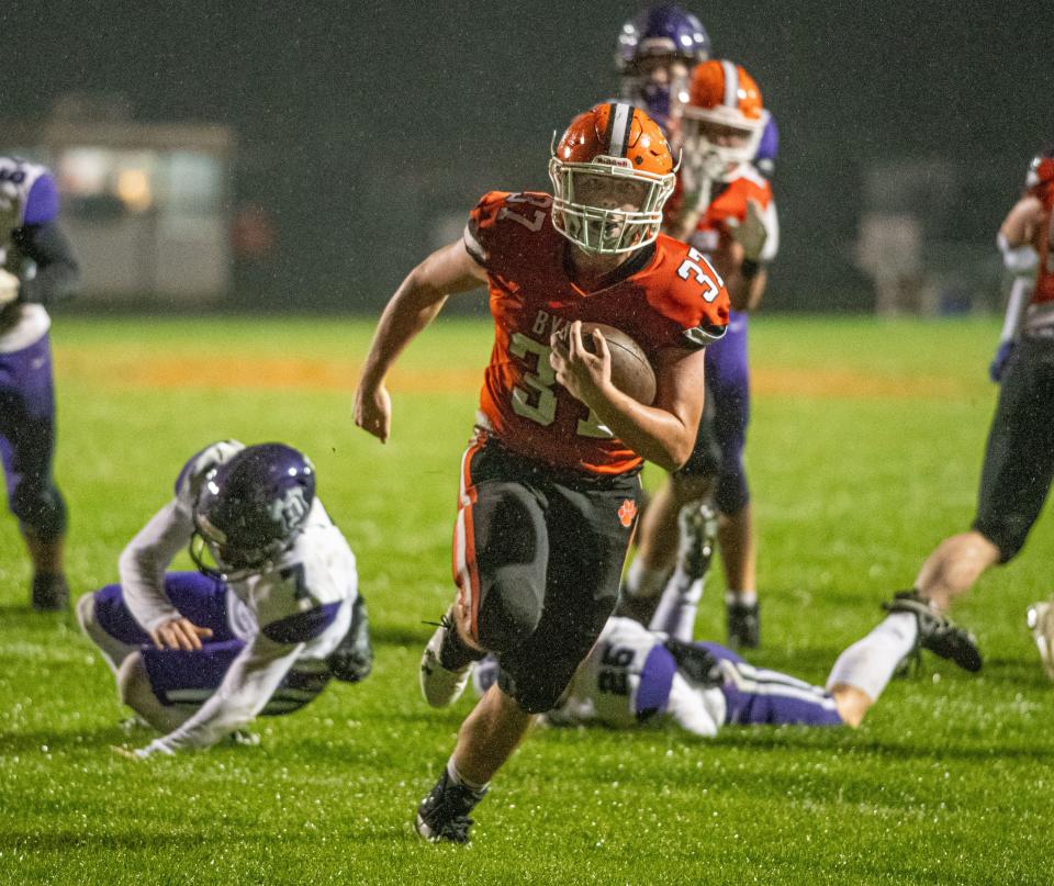 Byron's Caden Considine runs for another touchdown in the second quarter of their game against Dixon on Friday, Oct. 13, 2023, in Byron.