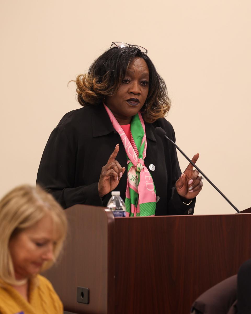 Dr. Geraldine Hayes Nelson, former president of the Portage County NAACP, moderates a community discussion on race and education Tuesday evening in Kent.