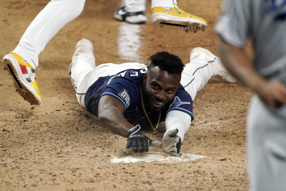 How did World Series Game 4 reach the mind-bending conclusion that saw the Tampa Bay Rays tie up the series? It started with these key plays.(Photo by Cooper Neill/MLB Photos via Getty Images)