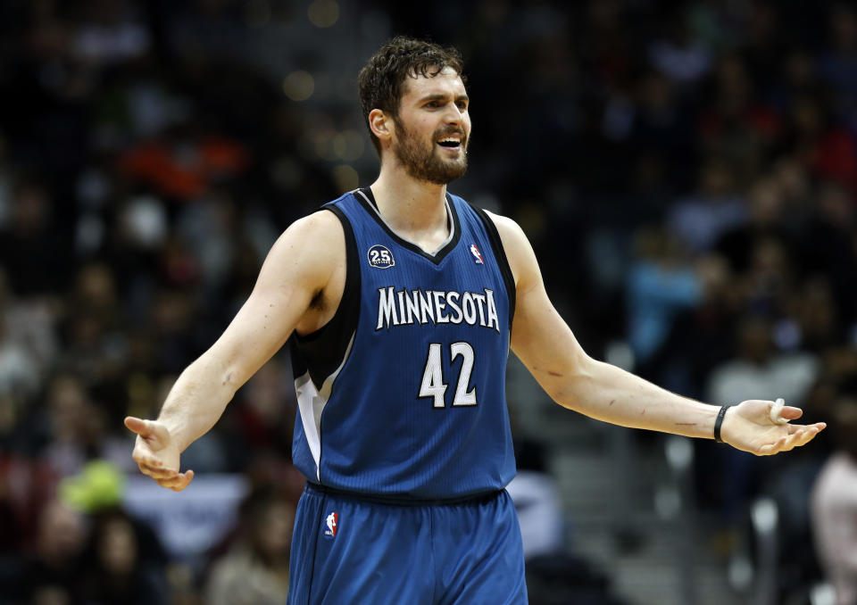 Minnesota Timberwolves forward Kevin Love reacts after a foul call during the second half of the Timberwolves' NBA basketball game against the Atlanta Hawks on Saturday, Feb. 1, 2014, in Atlanta. Atlanta won 120-113 despite Love's 43 points and 19 rebounds. (AP Photo/John Bazemore)