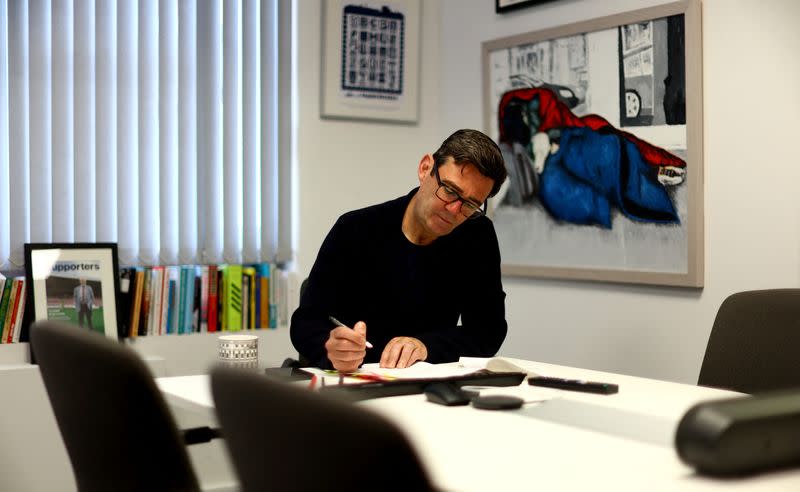 Mayor of Greater Manchester, Andrew Burnham, works in his office in Manchester