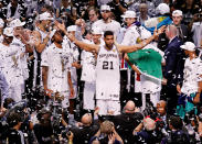 <p>2014: Tim Duncan #21 of the San Antonio Spurs celebrates after defeating the Miami Heat in Game Five of the 2014 NBA Finals at the AT&T Center on June 15, 2014 in San Antonio, Texas.</p>