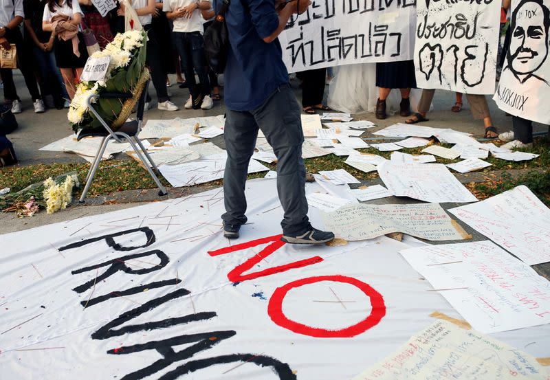 Thai students protest against a court's decision that dissolved the country's second largest opposition Future Forward Party, less than a year after an election to end direct military rule, at Chulalongkorn University, in Bangkok