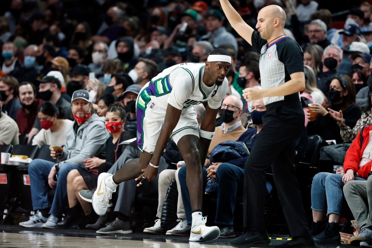 Bucks center Bobby Portis gestures after making a three-point basket against the Trail Blazers on Saturday night. Portis hit 6 of his 8 three-point attempts.