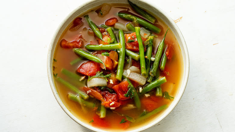 vegetable soup in white bowl