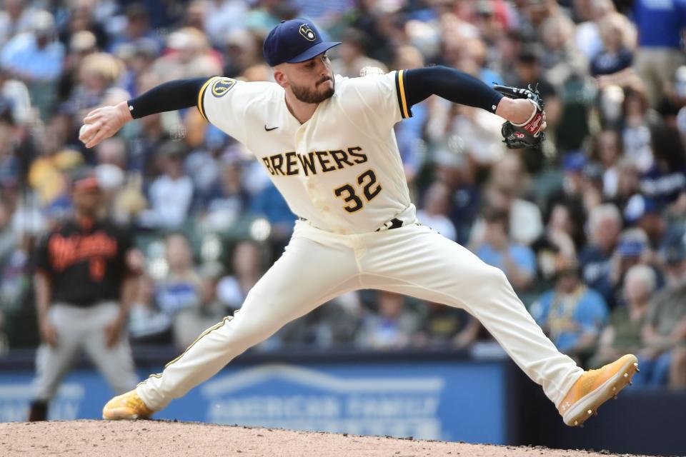 Jun 8, 2023; Milwaukee, Wisconsin, USA; Milwaukee Brewers pitcher Peter Strzelecki (32) pitches against the Baltimore Orioles in the eighth inning at American Family Field. Mandatory Credit: Benny Sieu-USA TODAY Sports