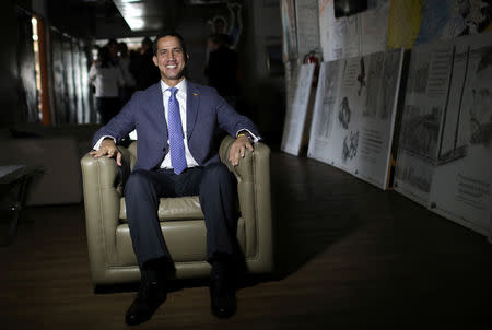 Venezuelan opposition leader Juan Guaido, who many nations have recognized as the country's rightful interim ruler, smiles as he poses for picture after an interview with Reuters in Caracas, Venezuela, May 22, 2019. REUTERS/Manaure Quintero