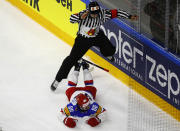 <p>A referee jumps over Nikita Kucherov of Russia who falls down after scoring a goal during the 2017 IIHF World Championship – Group A – Germany v Russia in Cologne, Germany on May 8, 2017. (Wolfgang Rattay/Reuters) </p>