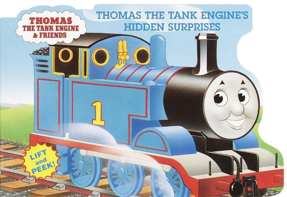 A cover of "Thomas the Tank Engine's Hidden Surprises" book with a smiling Thomas and interactive flaps