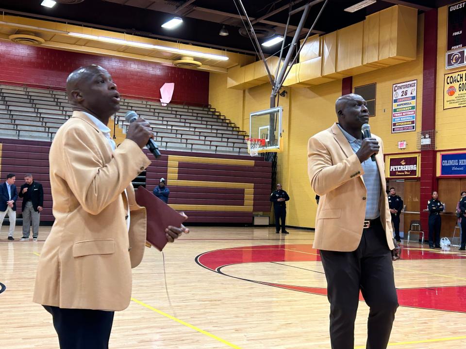 NFL Hall of Famers Darrell Green, left and Bruce Smith speak to freshman and sophomore students Monday, Oct. 16, 2023, at Petersburg High School. Green played 20 years with the then-Washington Redskins, and Smith, a Norfolk native, played 19 years with the Buffalo Bills and Redskins.