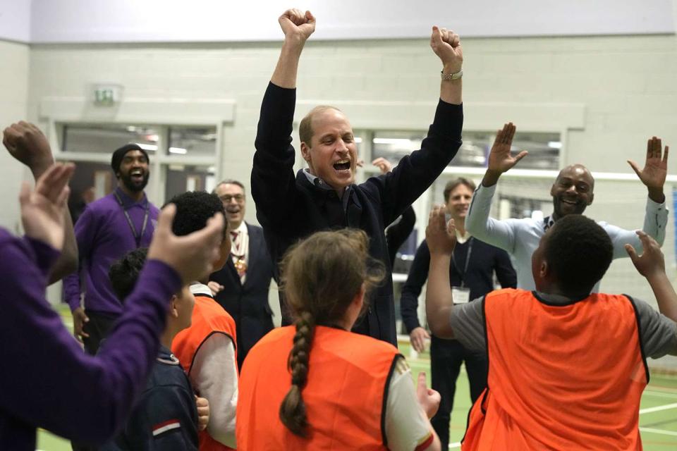 <p>Frank Augstein - WPA Pool/Getty Images</p> Prince William cheers at the WEST youth zone on March 14, 2024