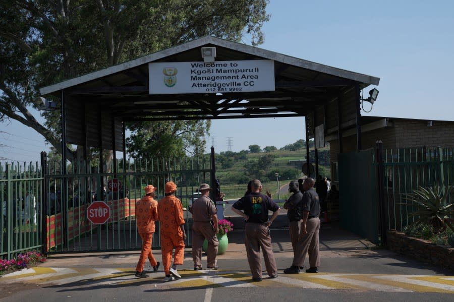 K-9 officers gather at the entrance of Atteridgeville Prison where Oscar Pistorius is being held, ahead of a parole hearing in Pretoria, South Africa, Friday, Nov. 24, 2023. The double-amputee Olympic runner was convicted of a charge comparable to third-degree murder for shooting Reeva Steenkamp in his home in 2013. (AP Photo/ Tsvangirayi Mukwazhi)