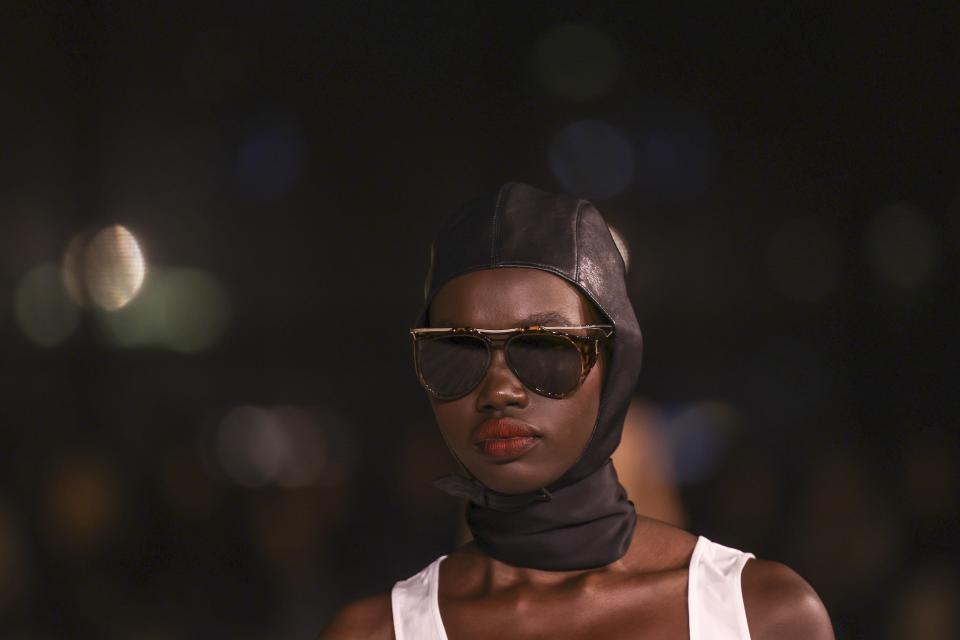 A model wears a creation for the Yves Saint Laurent Spring/Summer 2024 womenswear fashion collection presented Tuesday, Sept. 26, 2023 in Paris. (AP Photo/Vianney Le Caer)