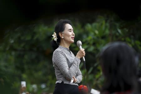 Myanmar pro-democracy leader Aung San Suu Kyi gives a speech during her campaign in her constituency of Kawhmu township outside Yangon September 21, 2015. REUTERS/Soe Zeya Tun