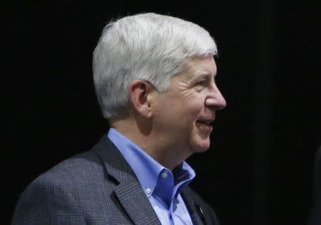 Michigan Governor Rick Snyder speaks during the official launch of VLF Automotive at the North American International Auto Show in Detroit, in this January 12, 2016 file photo. REUTERS/Gary Cameron/Files