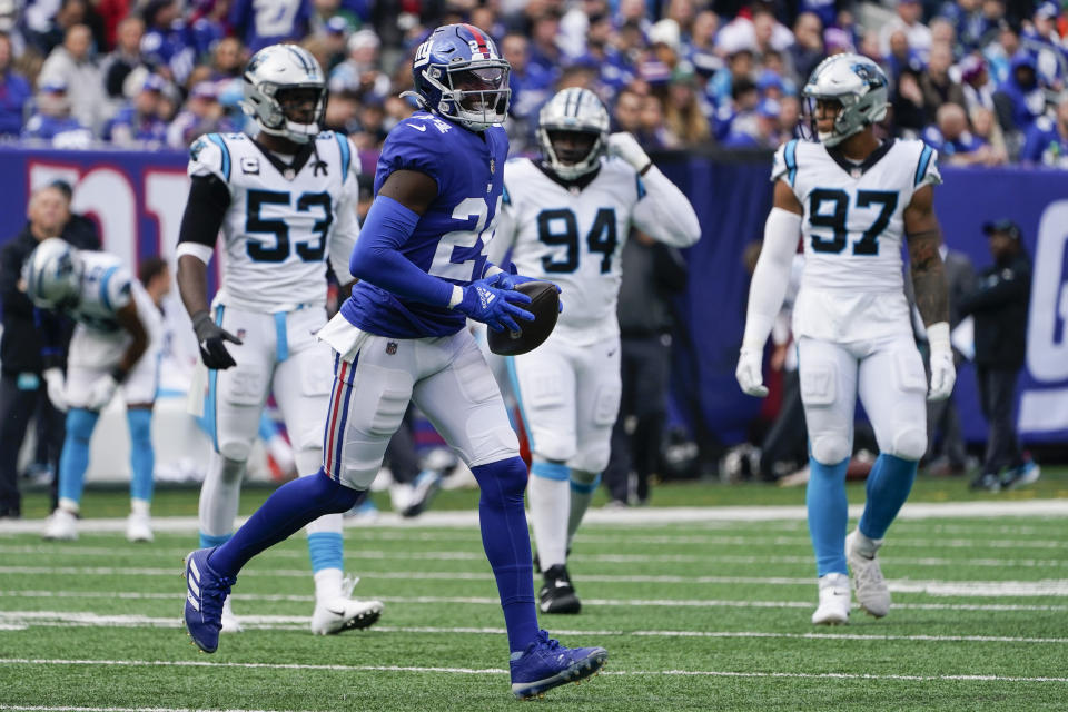 New York Giants cornerback James Bradberry (24) smiles after making an interception during the first half of an NFL football game against the Carolina Panthers, Sunday, Oct. 24, 2021, in East Rutherford, N.J. (AP Photo/Seth Wenig)