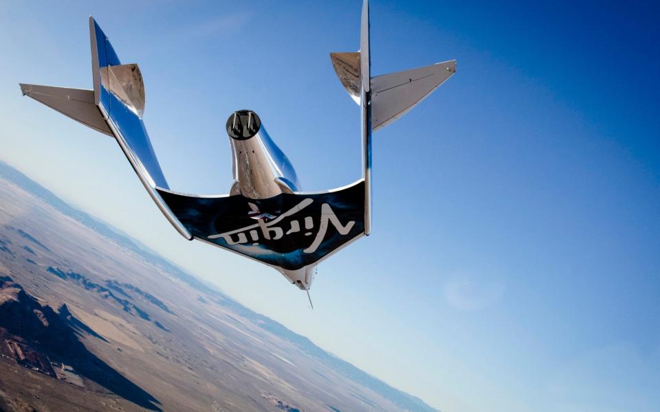 Handout photo issued by Virgin Galactic of the Virgin Spaceship Unity (VSS Unity) touching down after flying freely for the first time following release from Virgin Mothership Eve (VMS Eve) over the Mojave Desert, USA - Virgin Galactic/PA