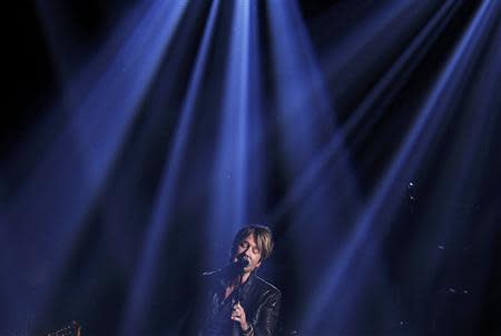 Musician Keith Urban performs "Even the Stars Fall for You" on stage at the 49th Annual Academy of Country Music Awards in Las Vegas, Nevada April 6, 2014. REUTERS/ Robert Galbriath