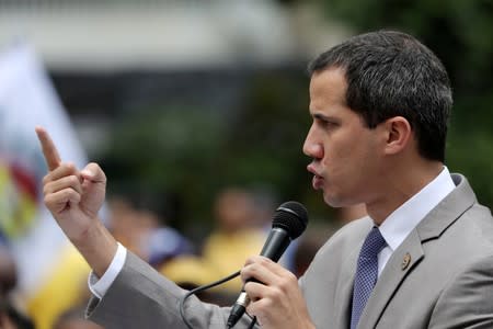 Venezuelan opposition leader Juan Guaido speaks during a gathering with supporters in Caracas