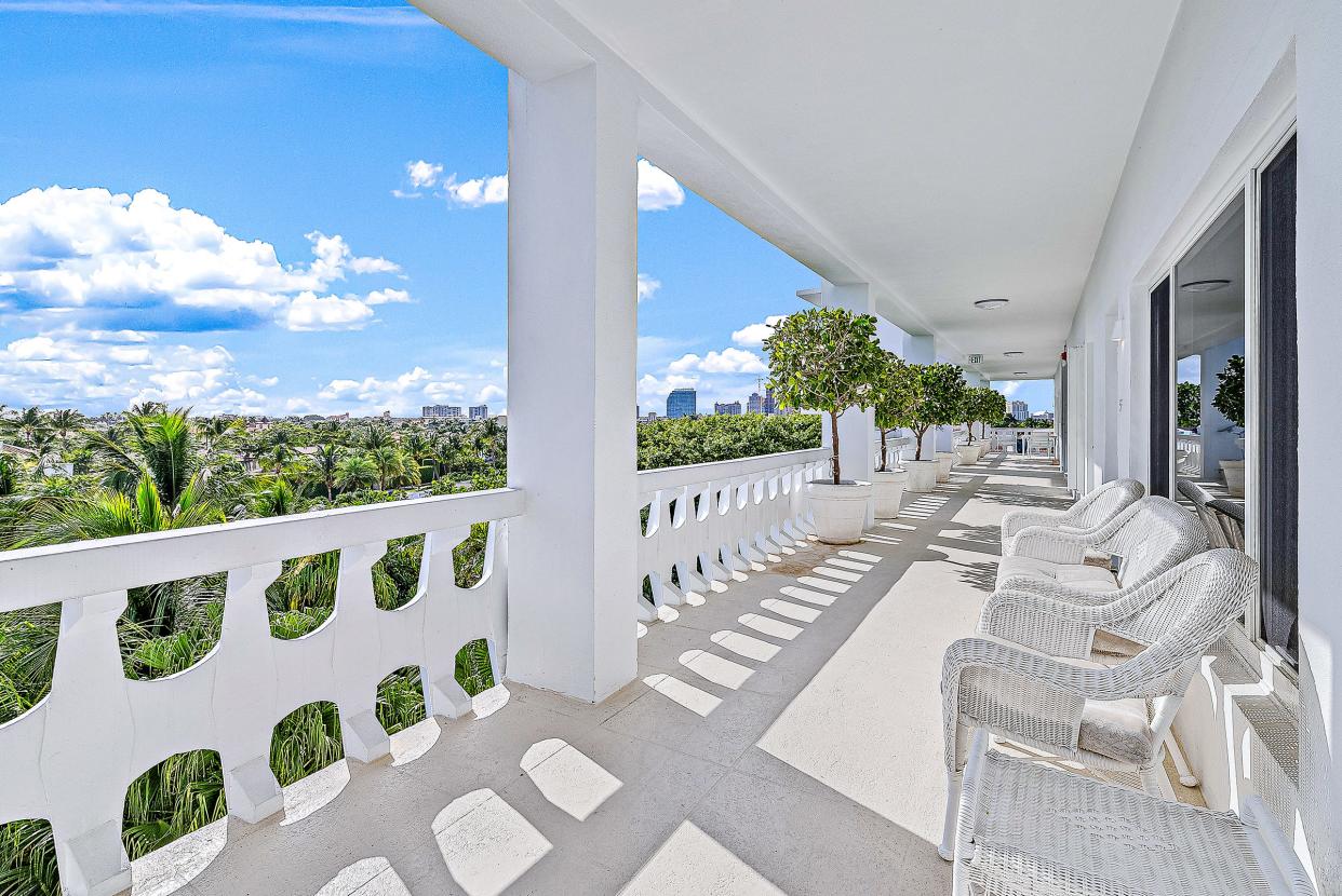 The front terrace outside No. 5F in the “300 Building” affords a view of Midtown Palm Beach, with West Palm Beach in the distance.
