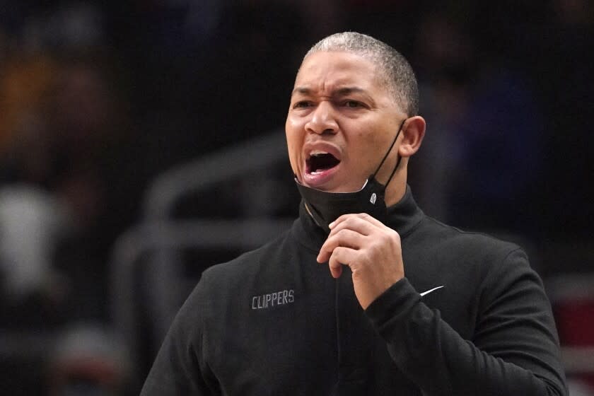 Los Angeles Clippers head coach Tyronn Lue yells to his team during the first half of an NBA basketball game against the Memphis Grizzlies Saturday, Jan. 8, 2022, in Los Angeles. (AP Photo/Mark J. Terrill)